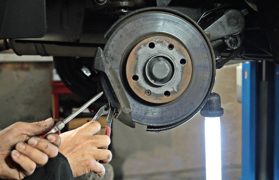 automotive mechanic servicing a vehicle